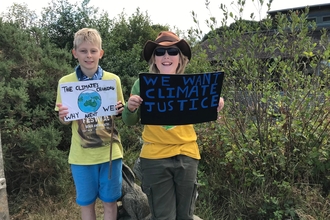 Living Seas Youth Forum members protesting 