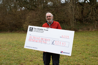 John Ibbotson with cheque 