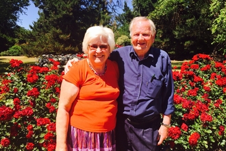Margaret and John Samuel in a garden