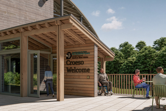 An artist impression of the proposed changes to the Welsh Wildlife Centre entrance. There are people of different ages, races and abilities in the image. 