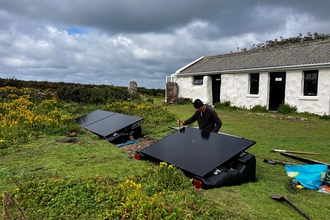 Skokholm solar panels being fitted on the island