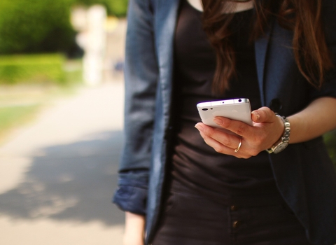 Person holding a smart phone